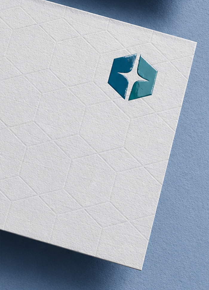 Cloud Genii geometric logo mark with embossed brand detail