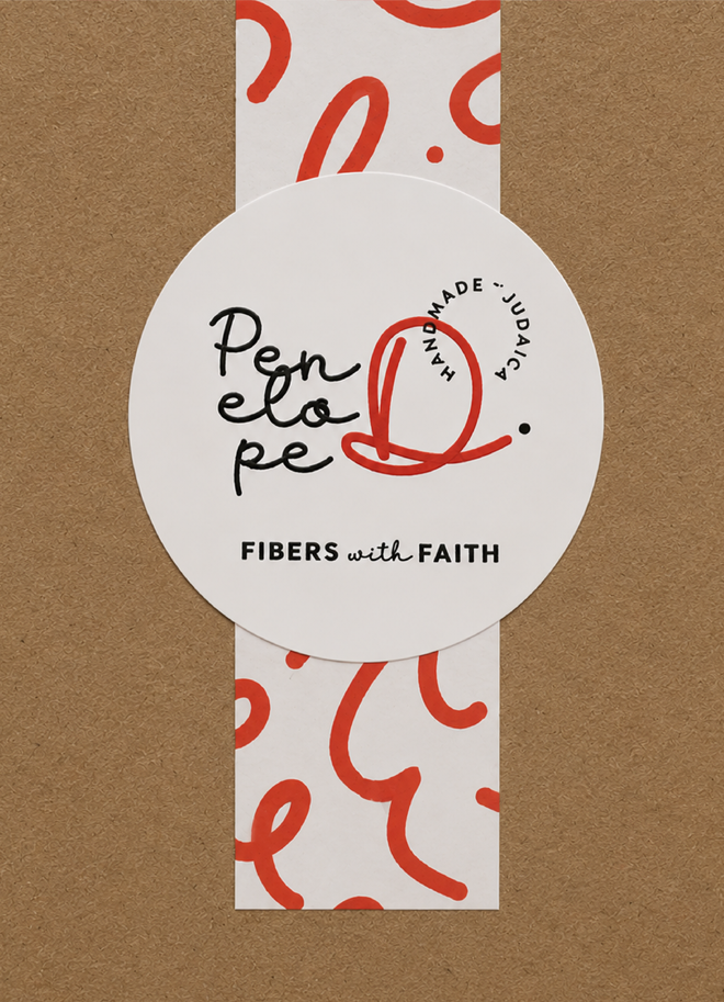 Penelope D Judaica circular logo sticker and elongated patterned sticker on kraft box packaging