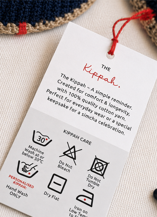 Back of a Penelope D Judaica kippah swing tag with care instructions