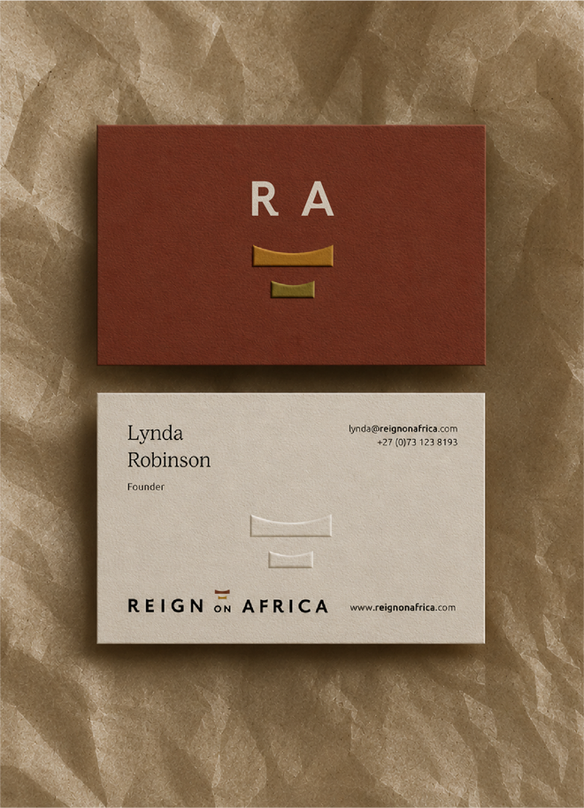 Front and back of Reign On Africa founder Lynda's branded business card on textured kraft tissue paper