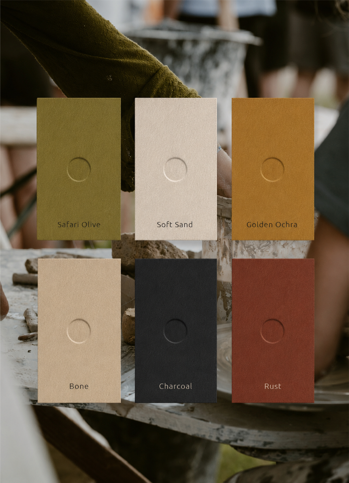 Reign On Africa brand colour palette featuring Safari Olive, Soft Sand, Golden Ochre, Bone, Charcoal and Rust